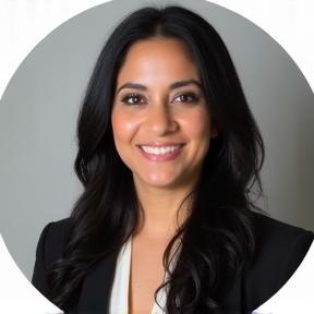 Professional headshot of Dr. Amina Al-Kuwari